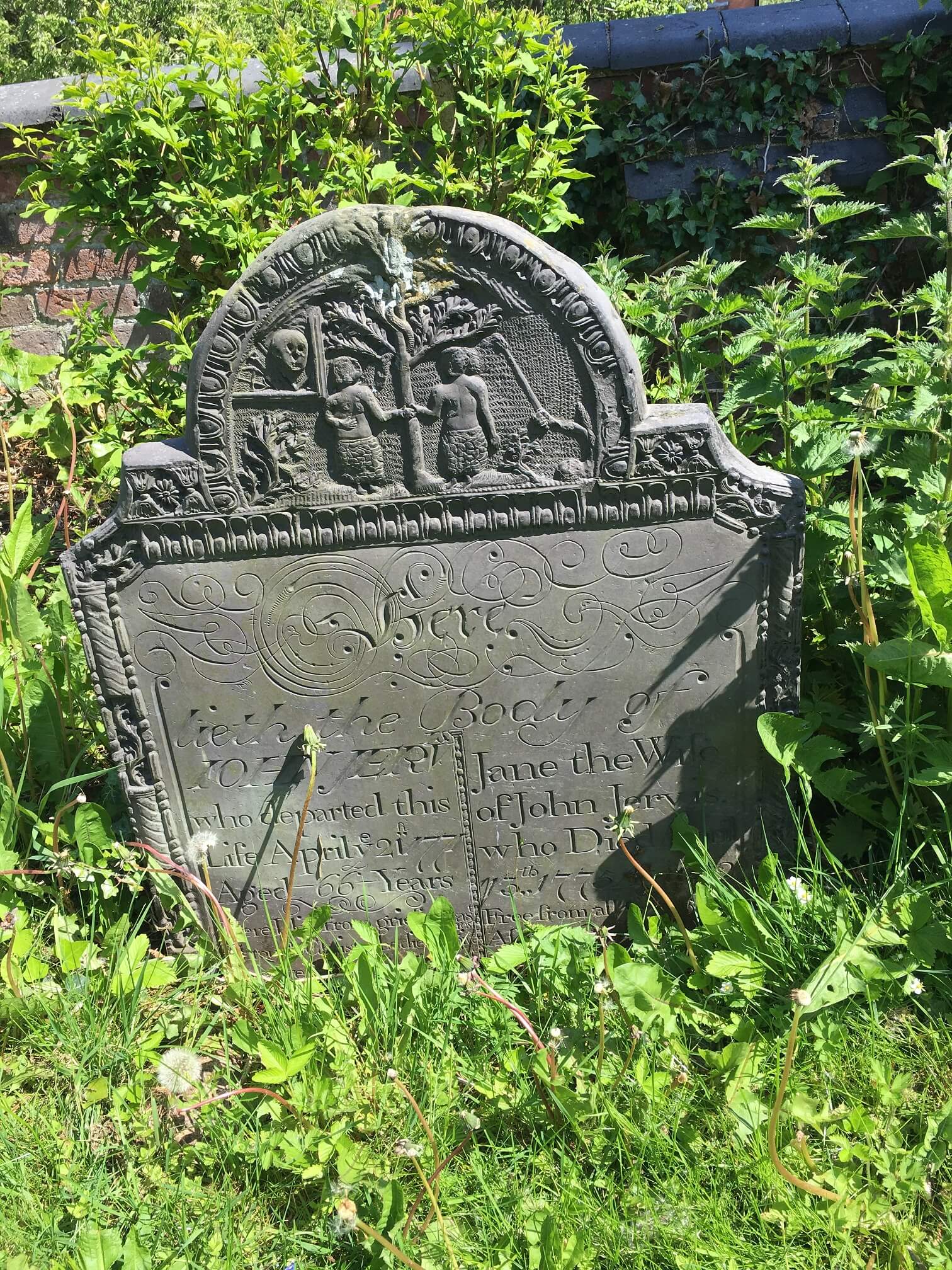 Swithland slate headstone depicting adam & eve. Church Langton