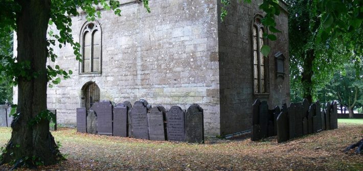 Church building and headstones, St Mary in Arden, Market Harborough.