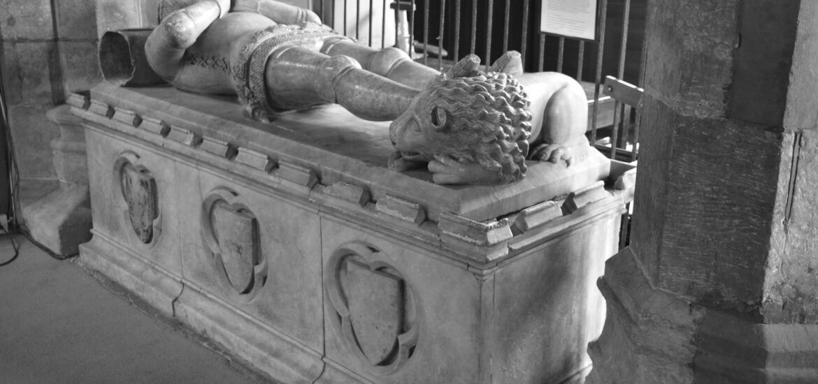 Black and white photo of The alabaster tomb of Sir John Swinford in St Andrew's Church, Spratton, Northamptonshire