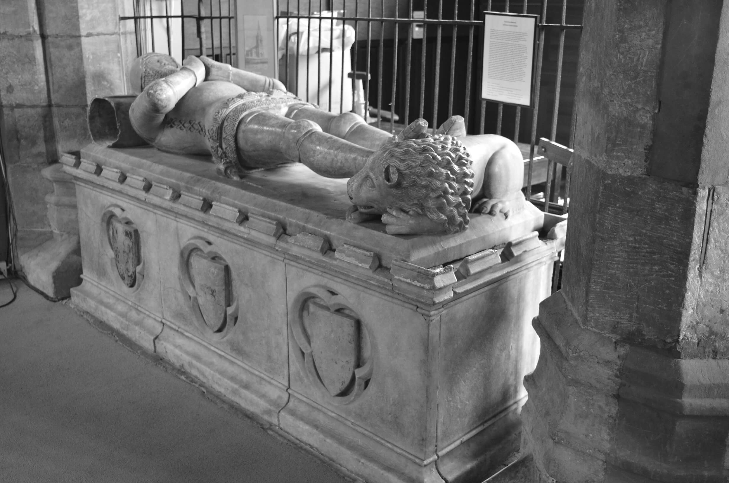 Black and white photo of The alabaster tomb of Sir John Swinford in St Andrew's Church, Spratton, Northamptonshire